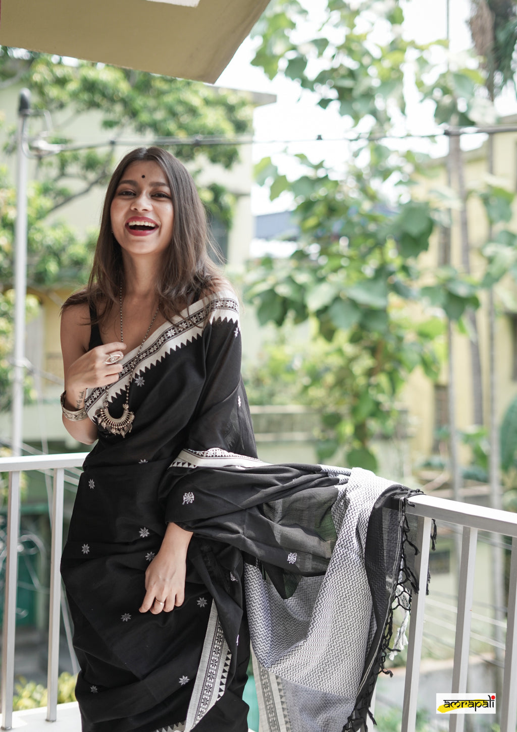 Women's Black Saree with White Traditional Border