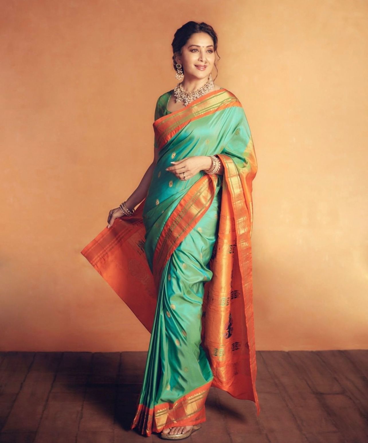 Aqua Green Kanjivaram Silk Saree with Orange Contrast Zari Border