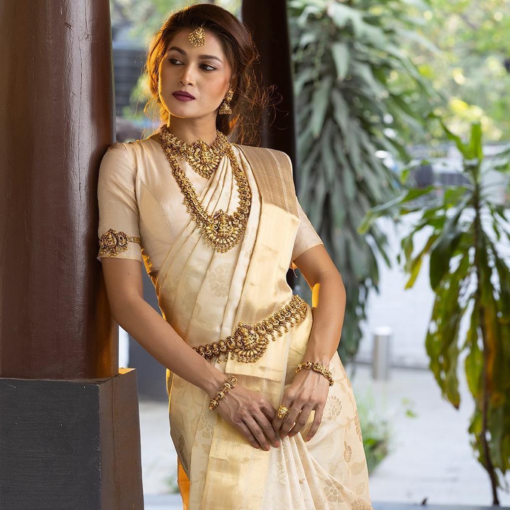 Classic Ivory Banarasi Silk Saree with Golden Zari Weaving