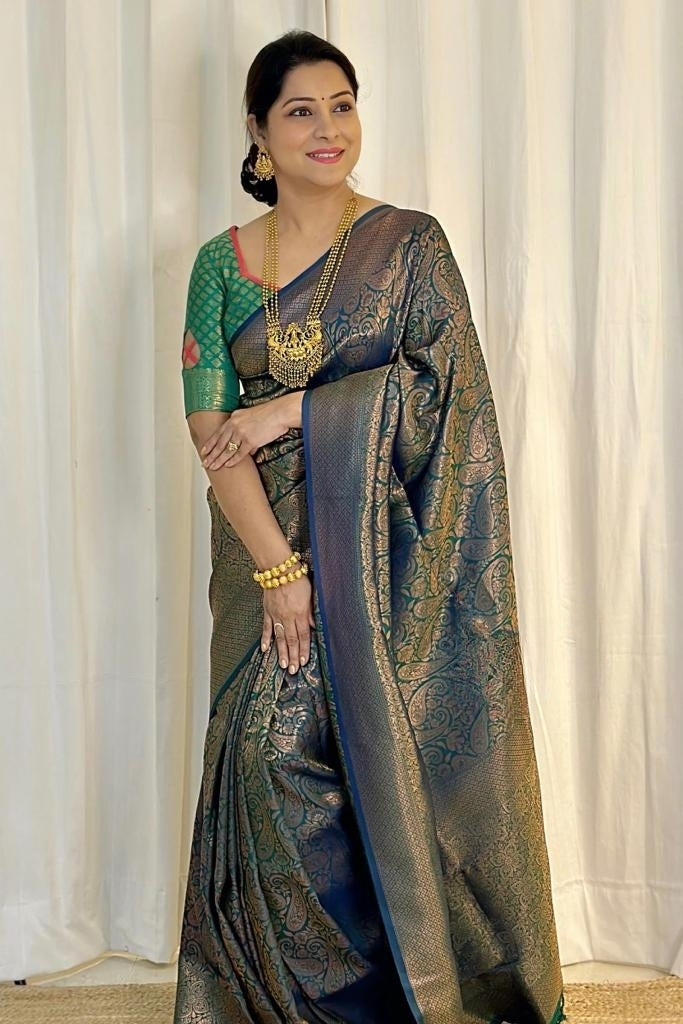 Women Paisley Woven Kanjeevaram Silk Saree with Contrast Border