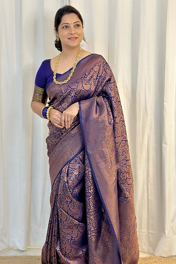 Women Paisley Woven Kanjeevaram Silk Saree with Contrast Border