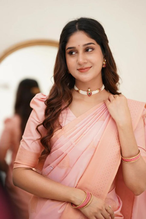 Women's Light Peach Silk Blend Saree with Elegant Solid Weave & Designer Border