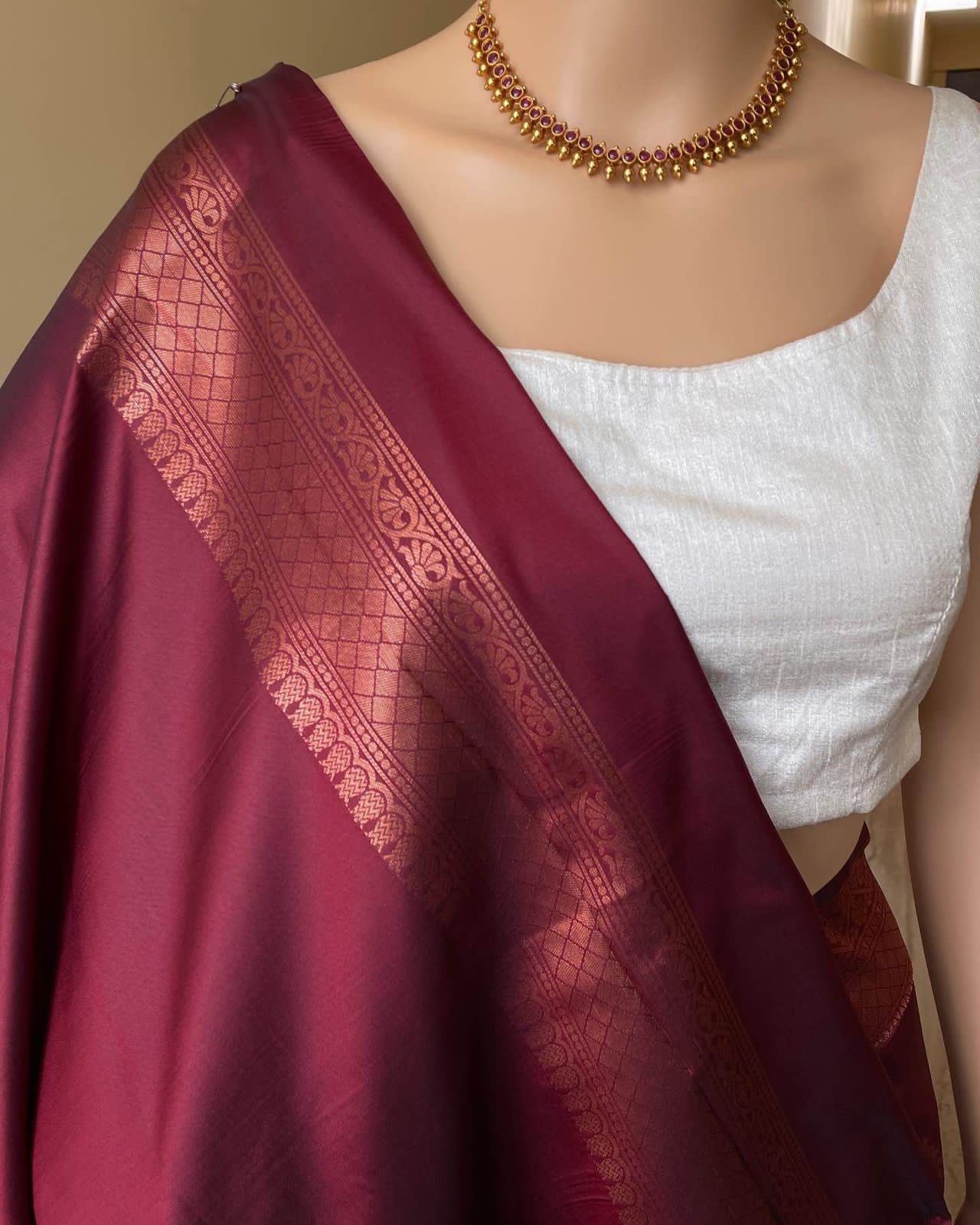 Women Kanjeevaram Saree with Floral Woven Motifs & Contrast Border