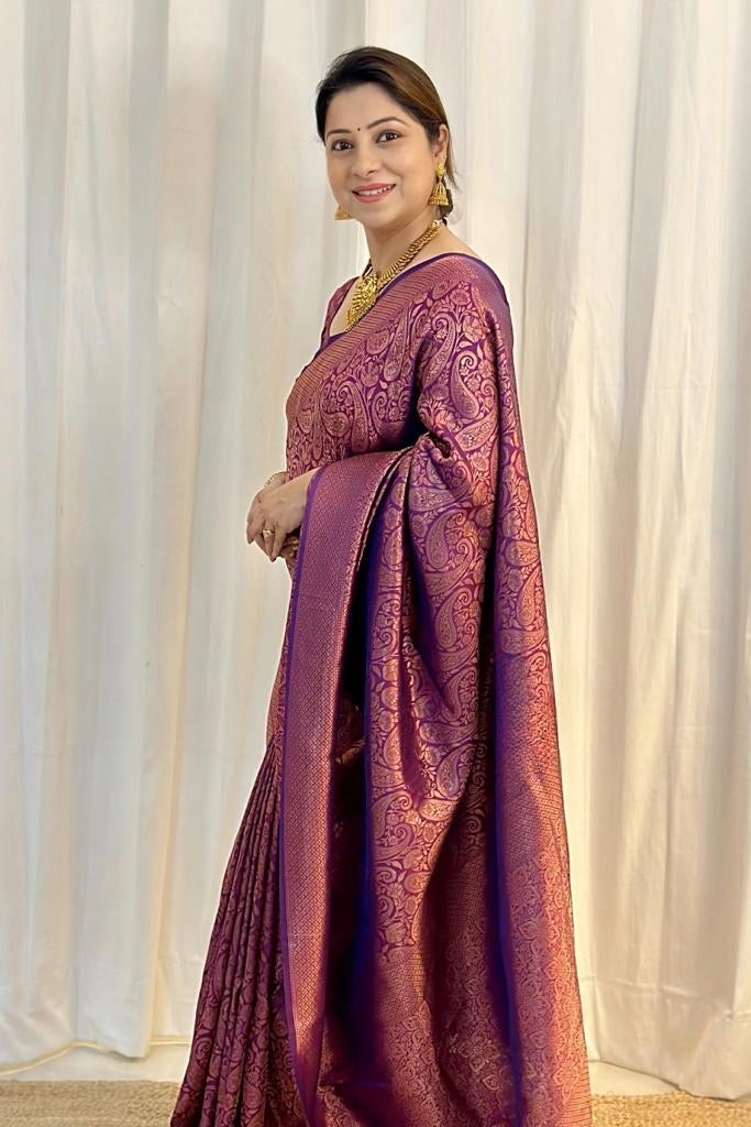 Women Paisley Woven Kanjeevaram Silk Saree with Contrast Border