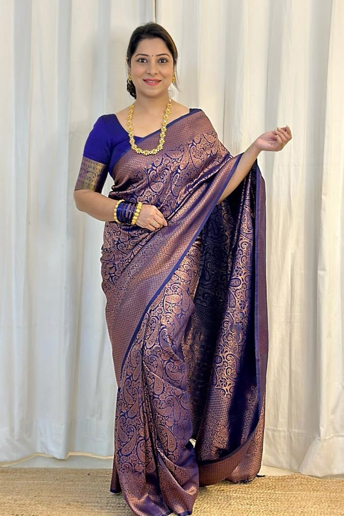 Women Paisley Woven Kanjeevaram Silk Saree with Contrast Border