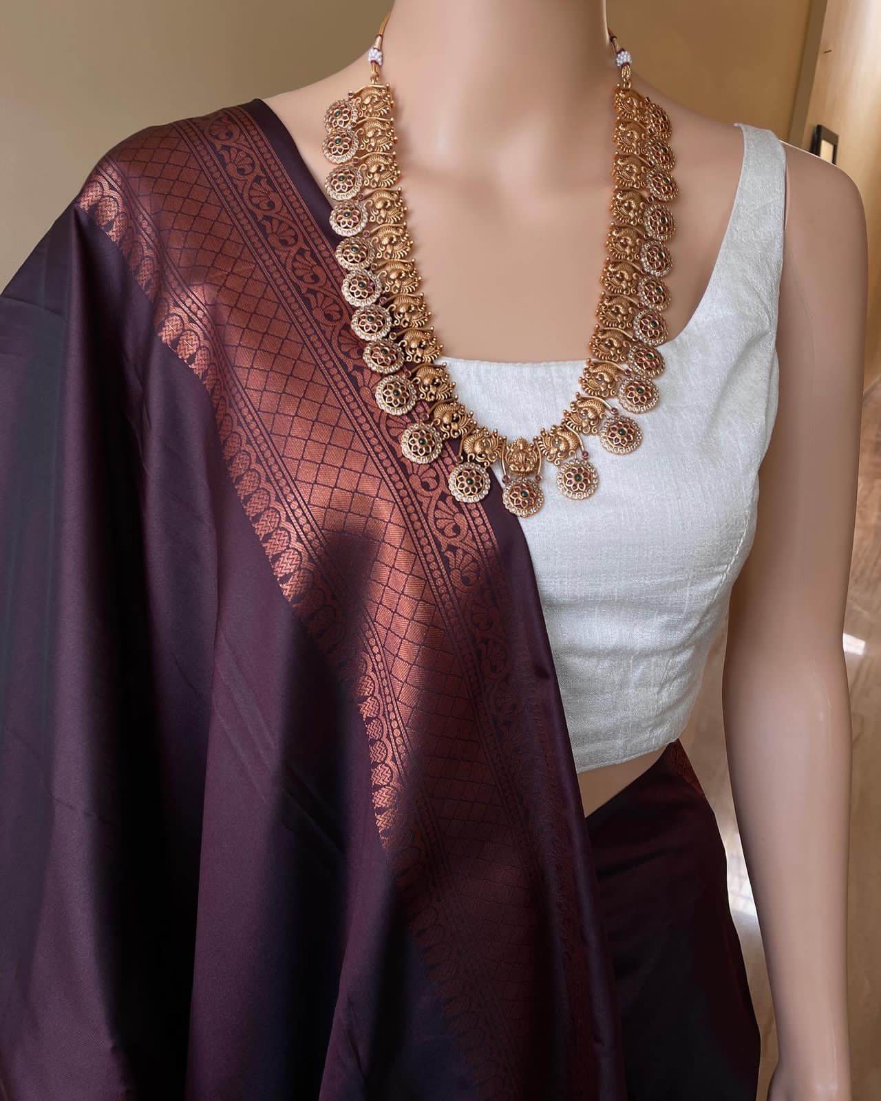 Women Kanjeevaram Saree with Floral Woven Motifs & Contrast Border
