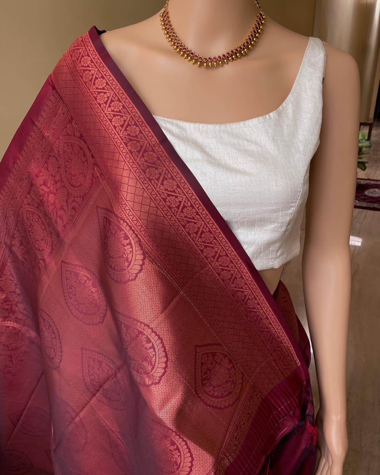Women Kanjeevaram Saree with Floral Woven Motifs & Contrast Border