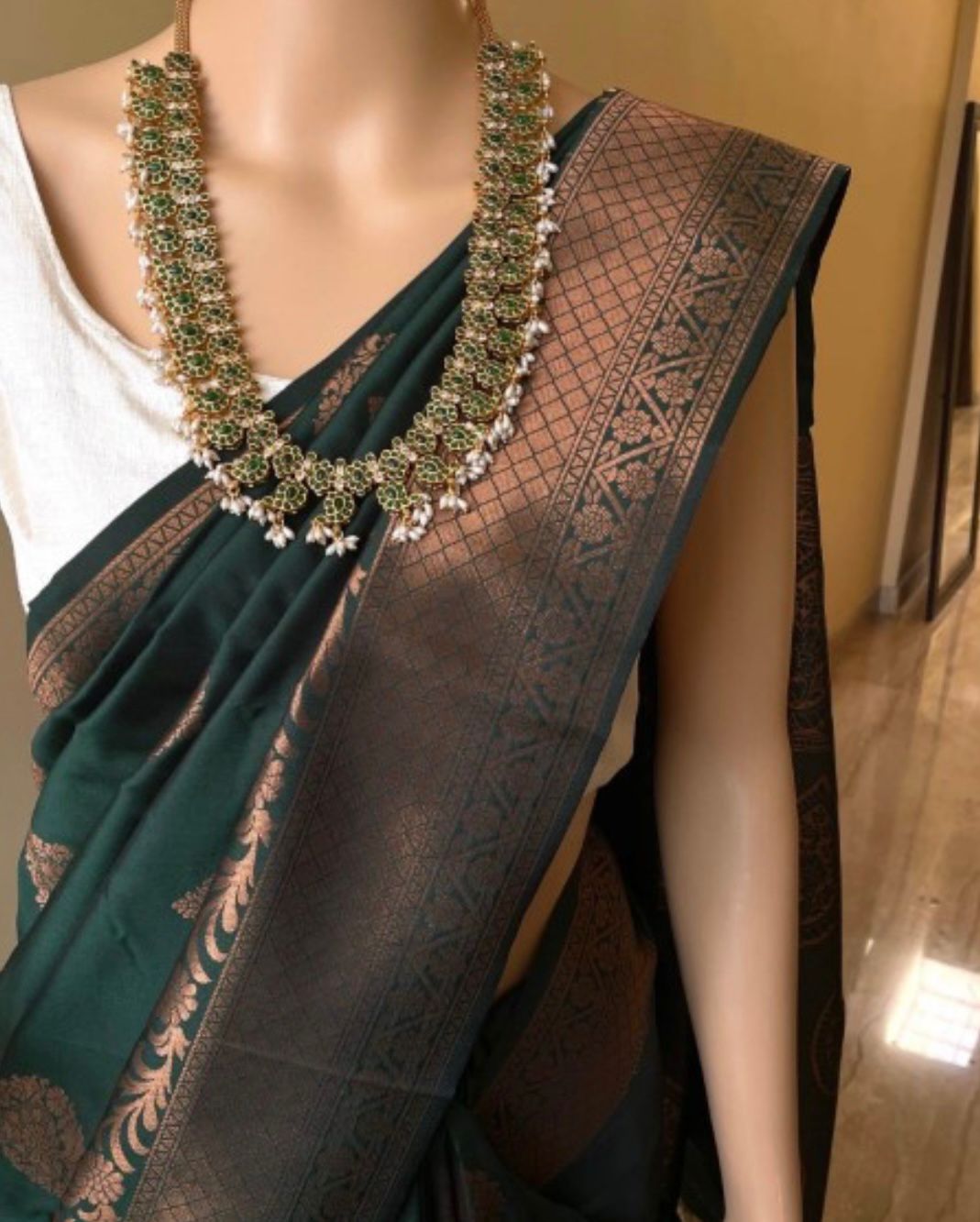 Women Kanjeevaram Saree with Floral Woven Motifs & Contrast Border