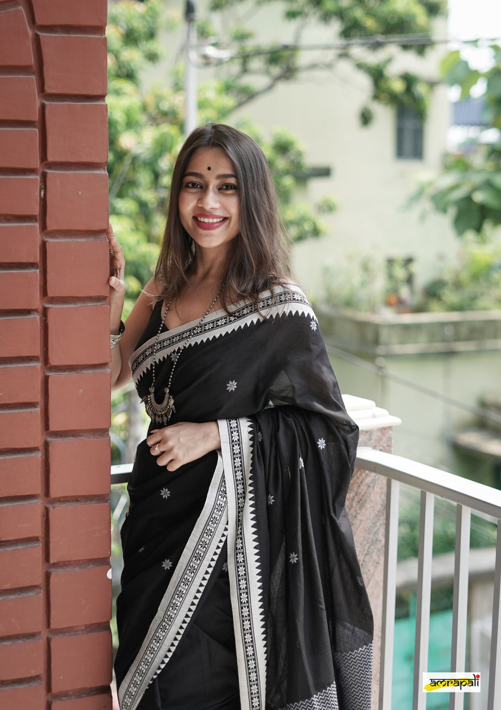 Women's Black Saree with White Traditional Border
