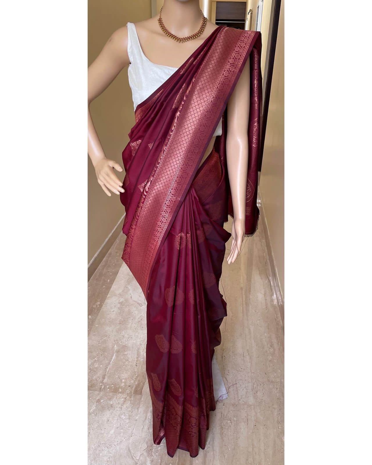 Women Kanjeevaram Saree with Floral Woven Motifs & Contrast Border