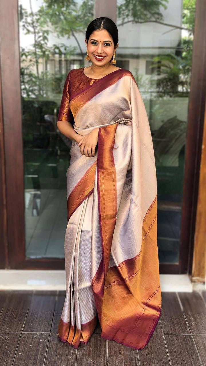 Women Floral Woven Saree with Contrast Border
