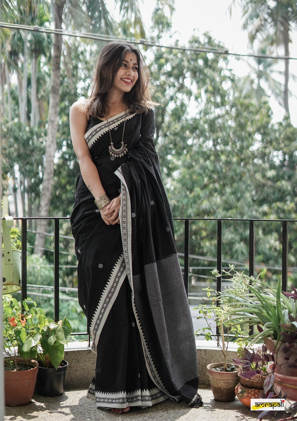 Women's Black Saree with White Traditional Border