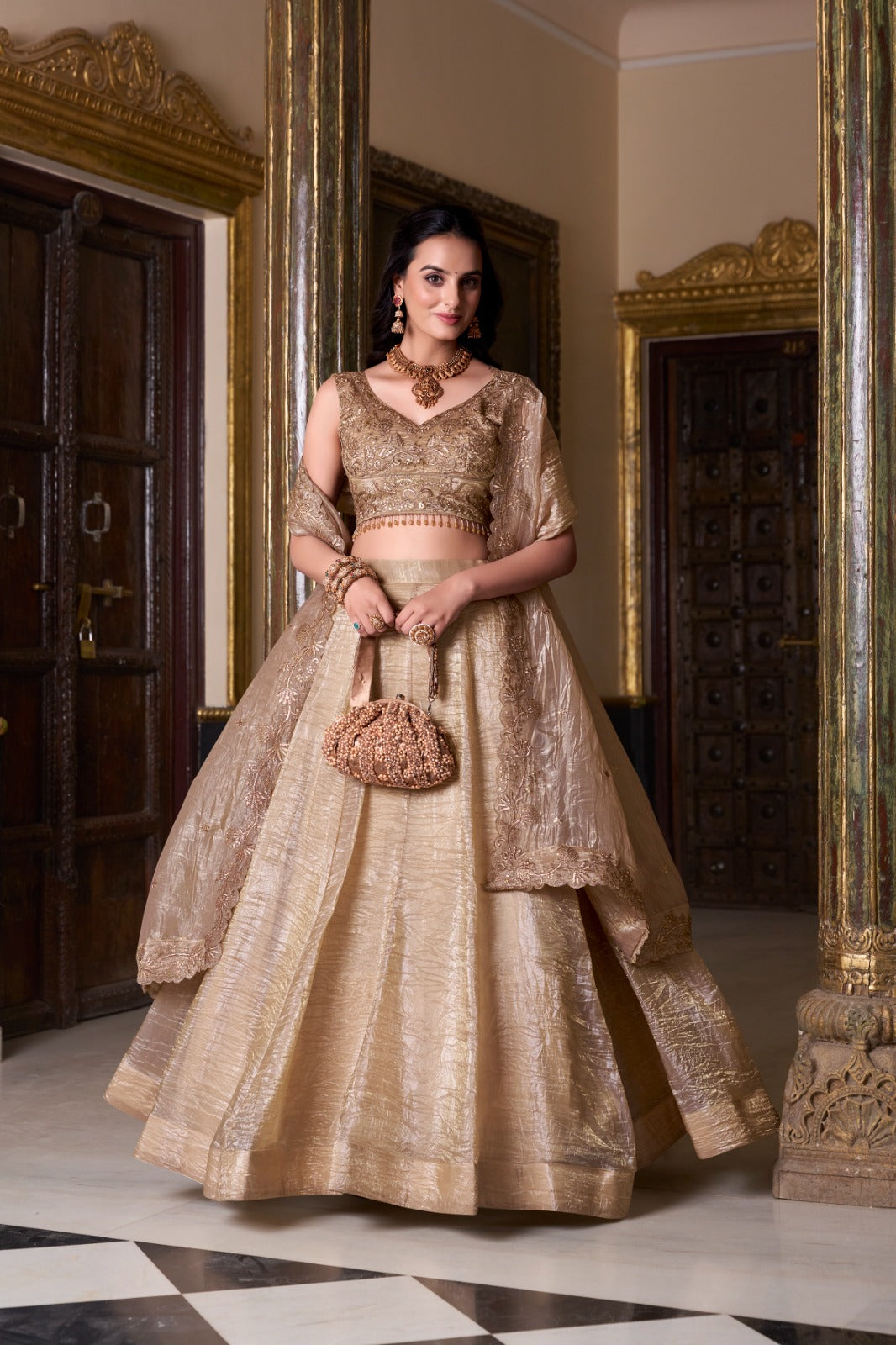 Champagne Gold Designer Lehenga Choli with Embroidered Blouse and Net Dupatta