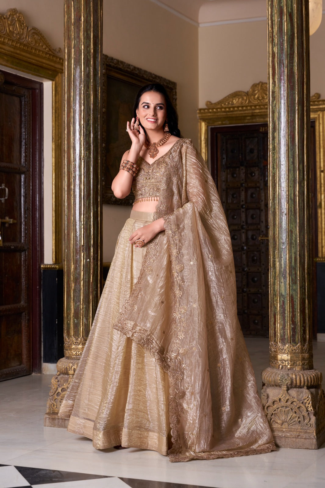 Champagne Gold Designer Lehenga Choli with Embroidered Blouse and Net Dupatta