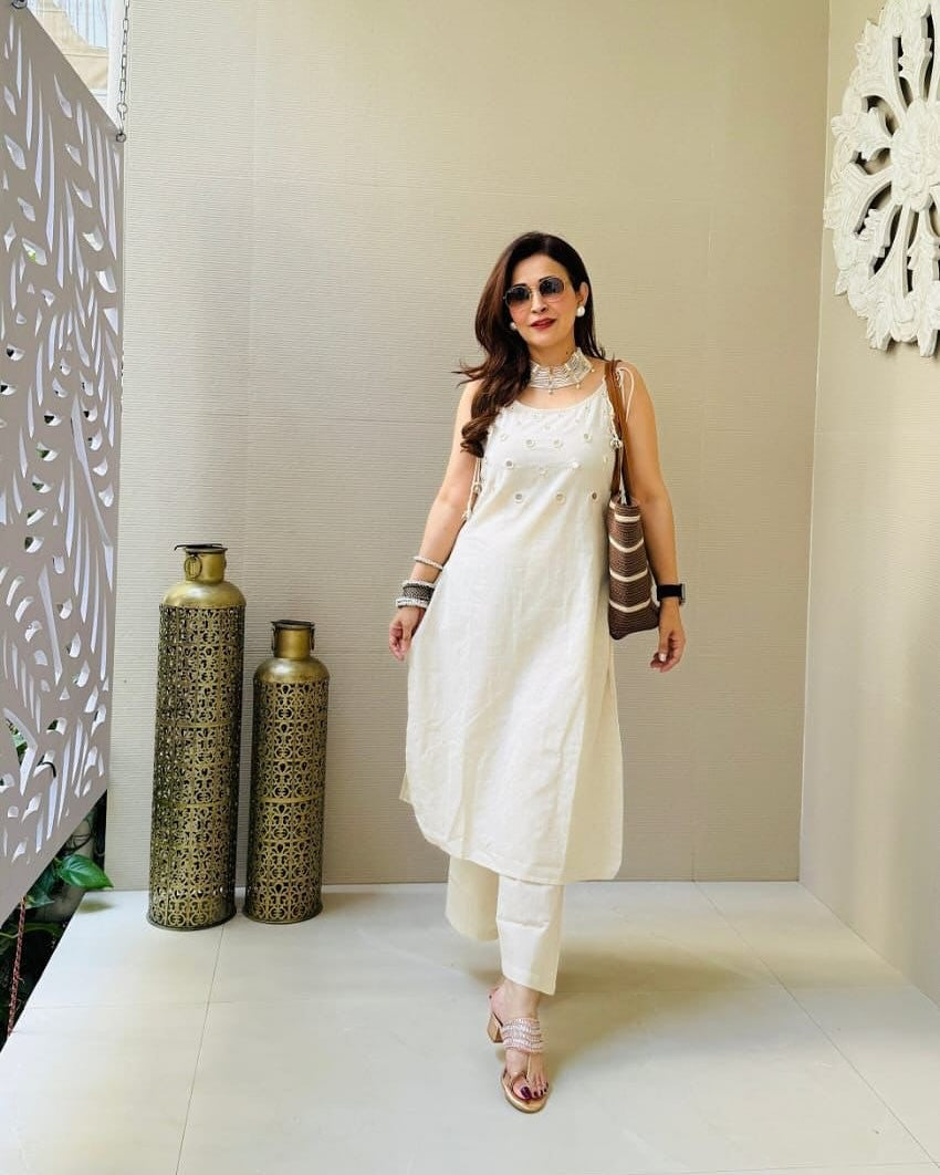 White Sleeveless Kurta Set with Embellished Detailing