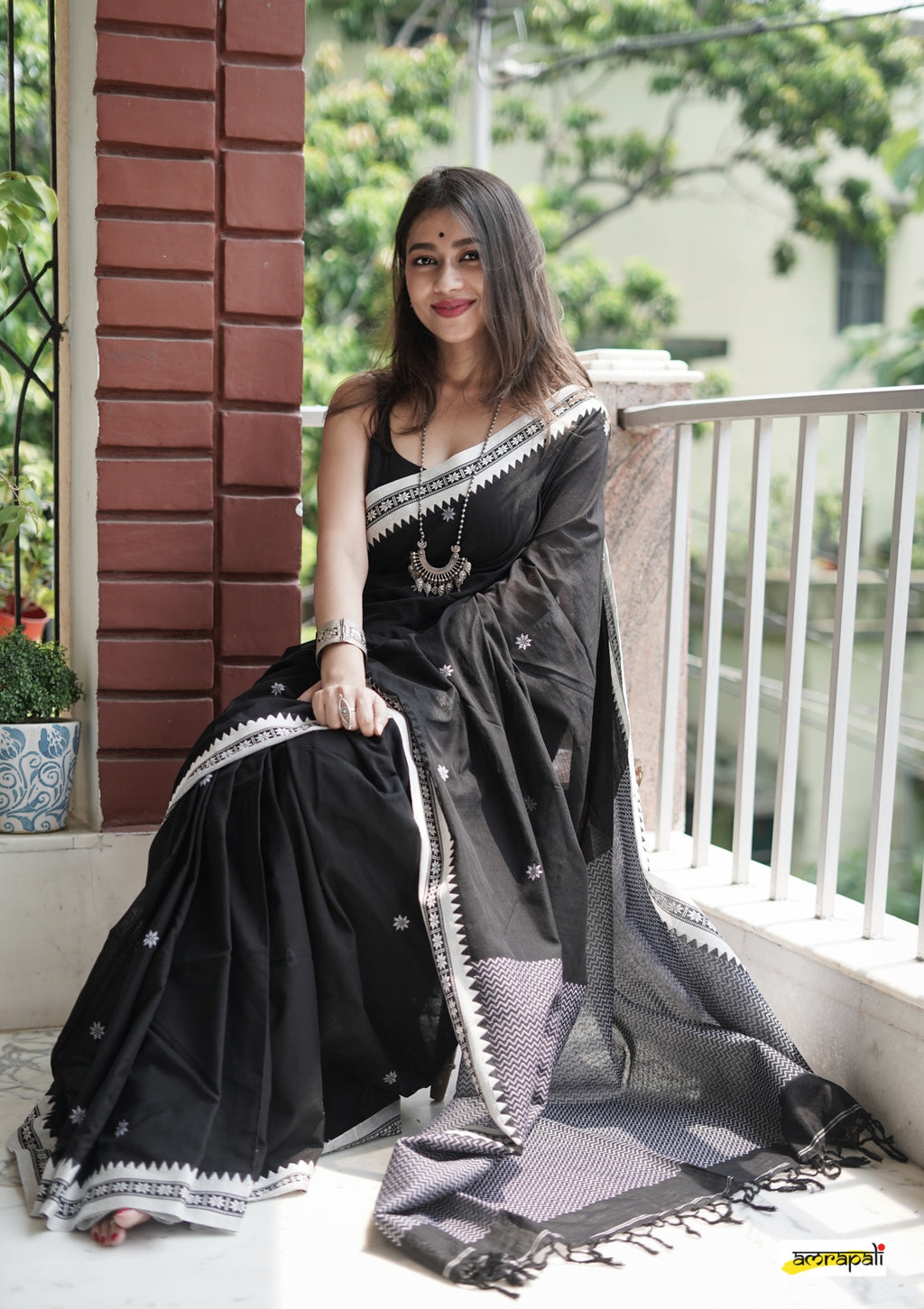 Women's Black Saree with White Traditional Border