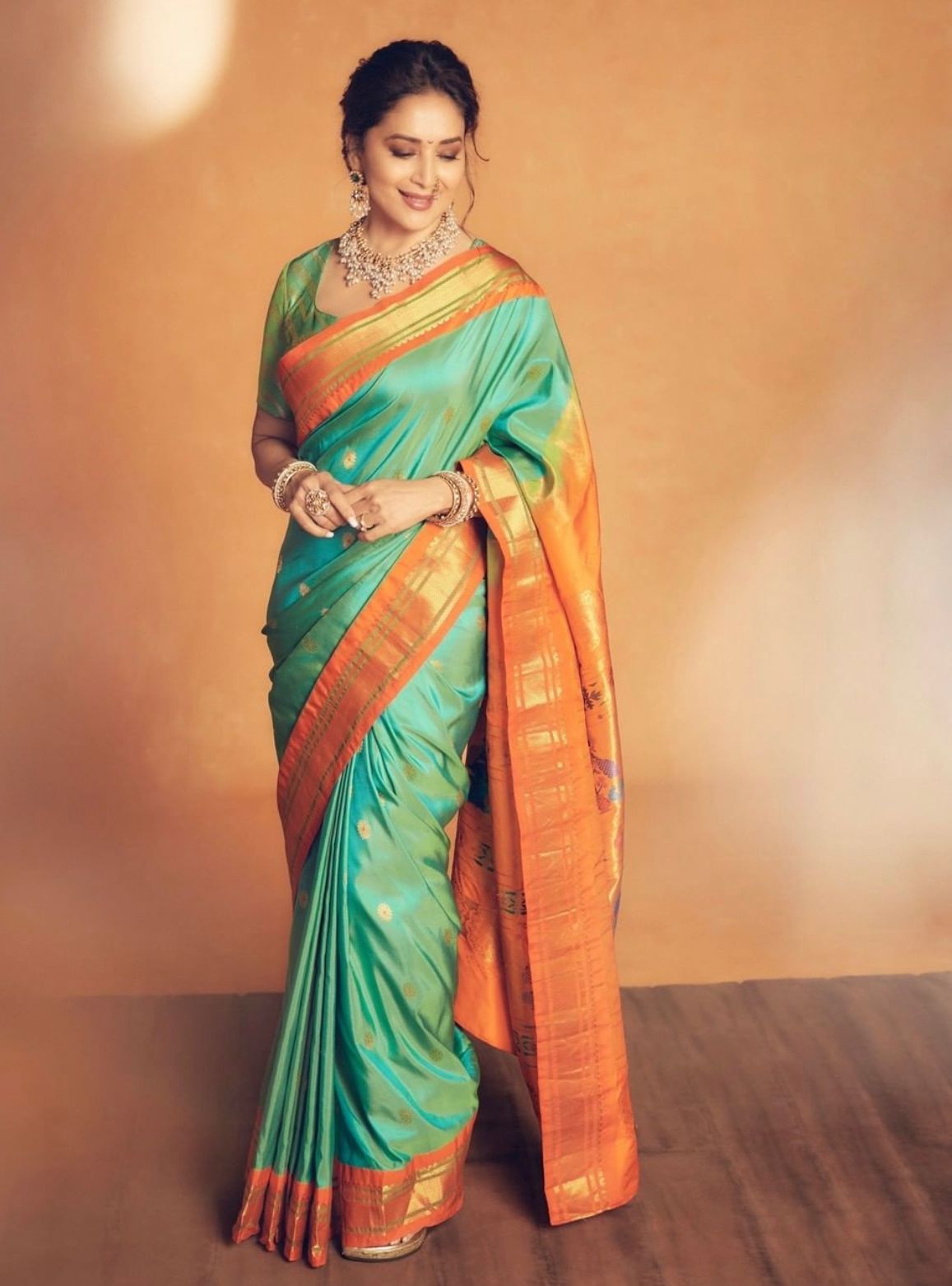 Aqua Green Kanjivaram Silk Saree with Orange Contrast Zari Border