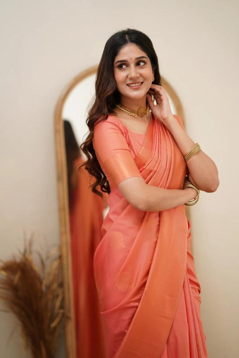Women's Peach Silk Blend Saree with Elegant Solid Weave & Designer Border