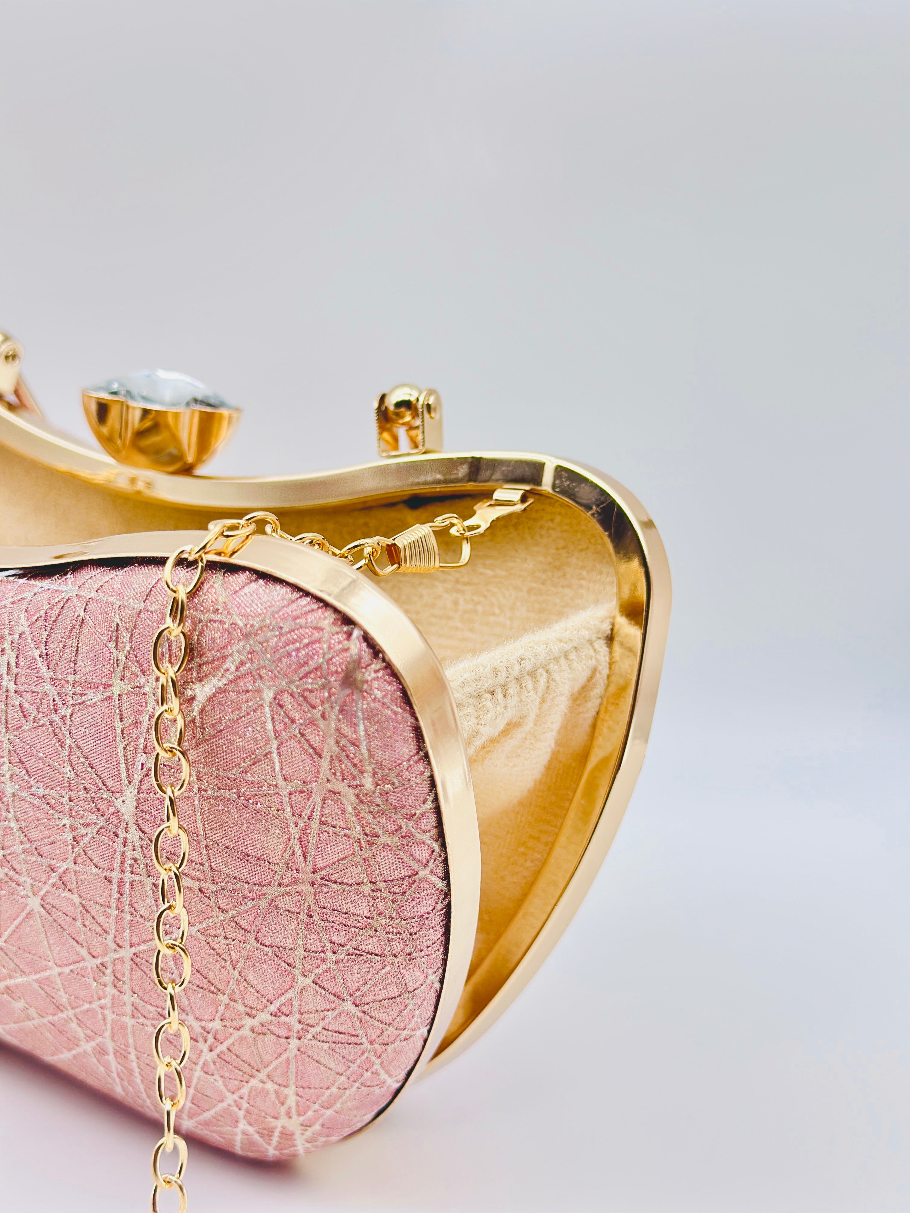 Blush Elegance Sculpted Pink Metallic Evening Clutch