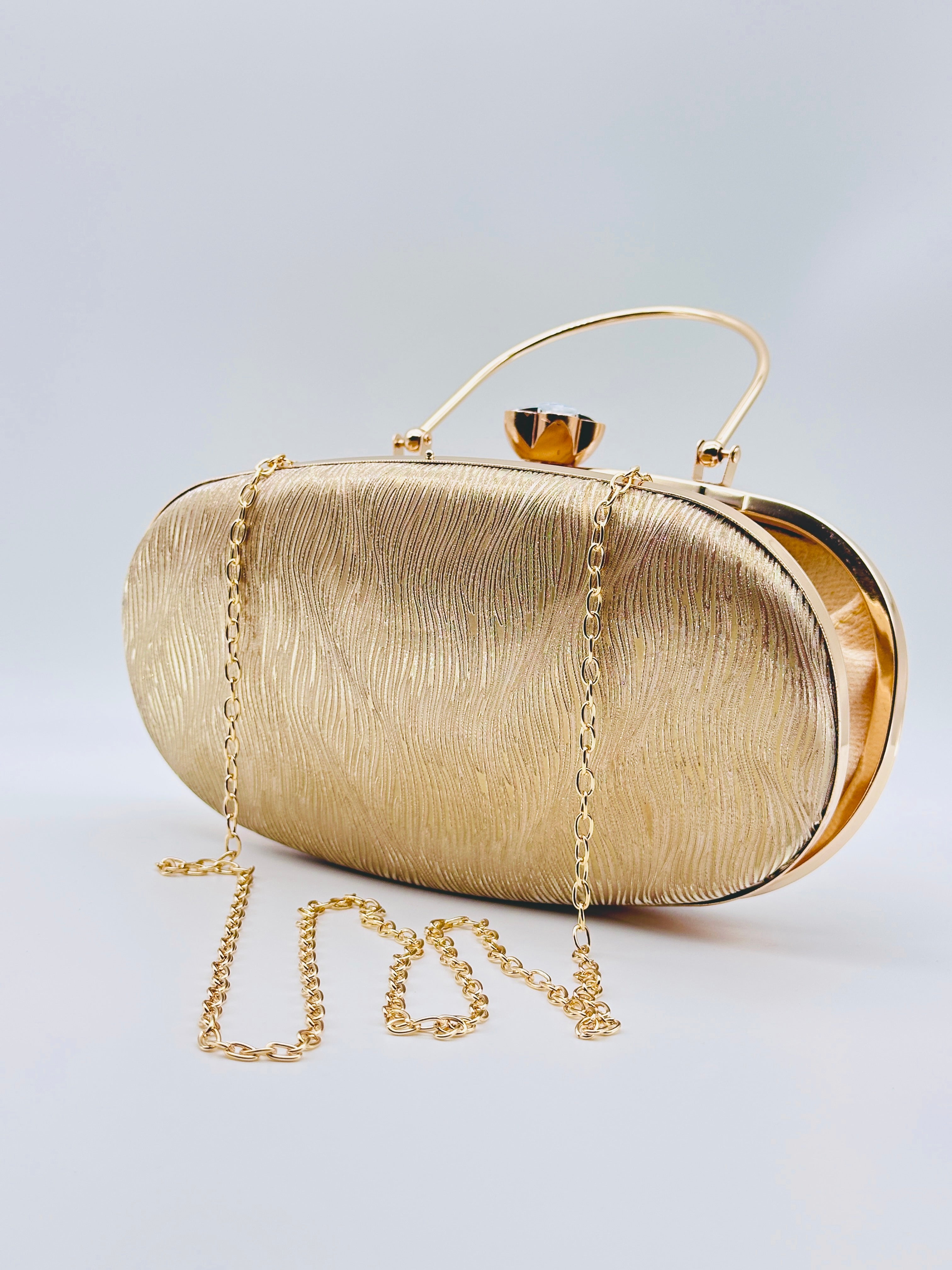 Golden Radiance Textured Oval Evening Clutch