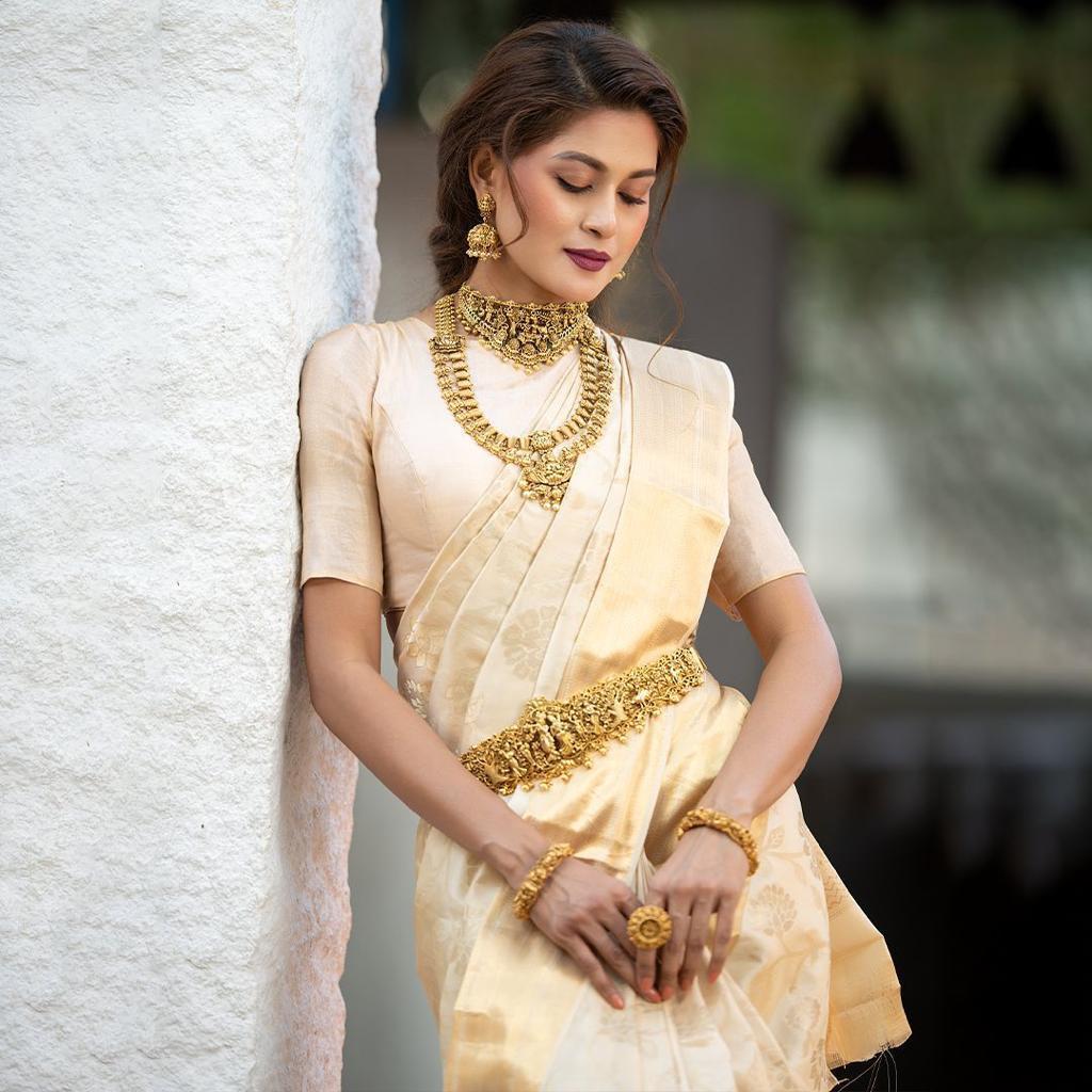 Classic Ivory Banarasi Silk Saree with Golden Zari Weaving