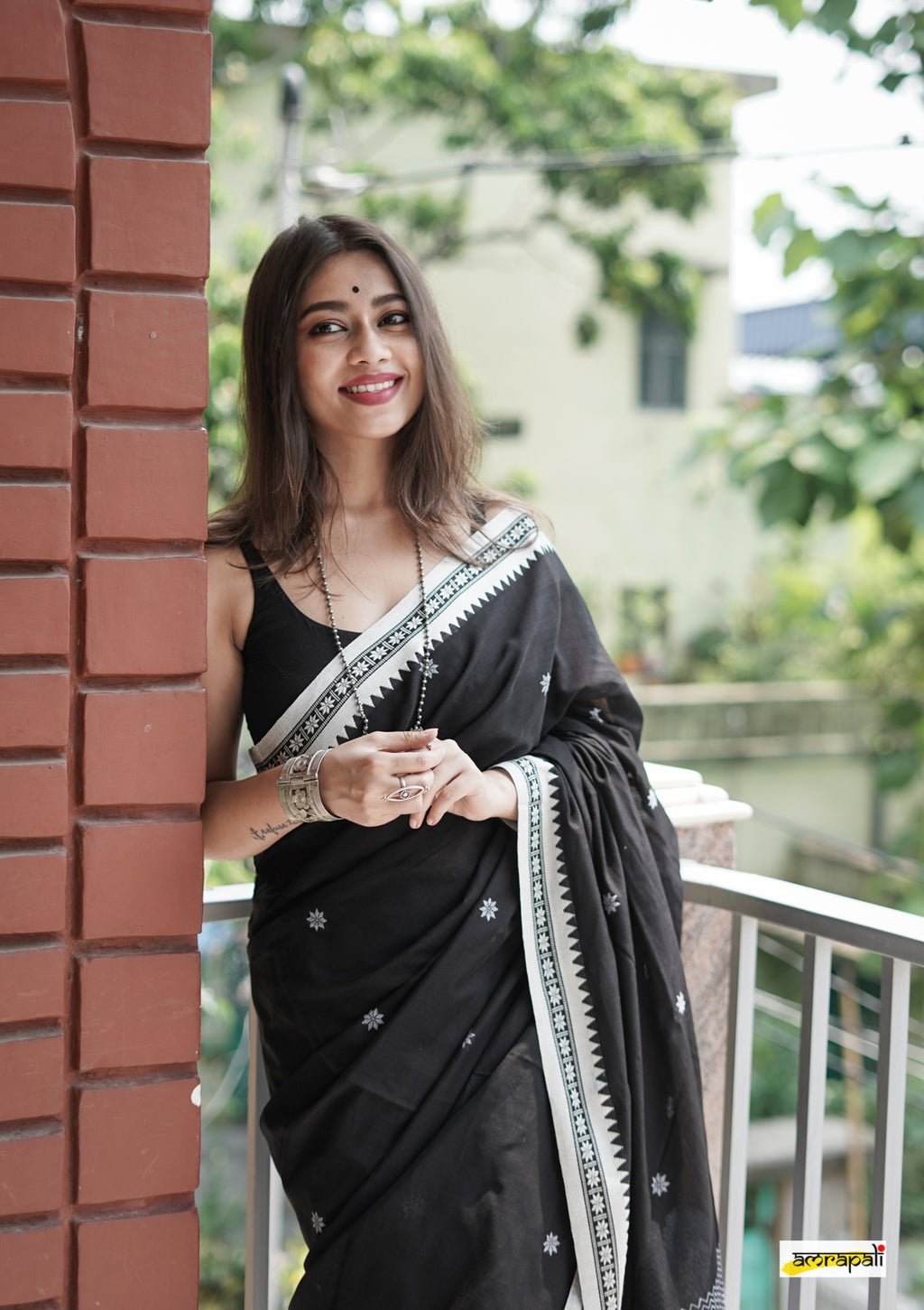 Women's Black Saree with White Traditional Border