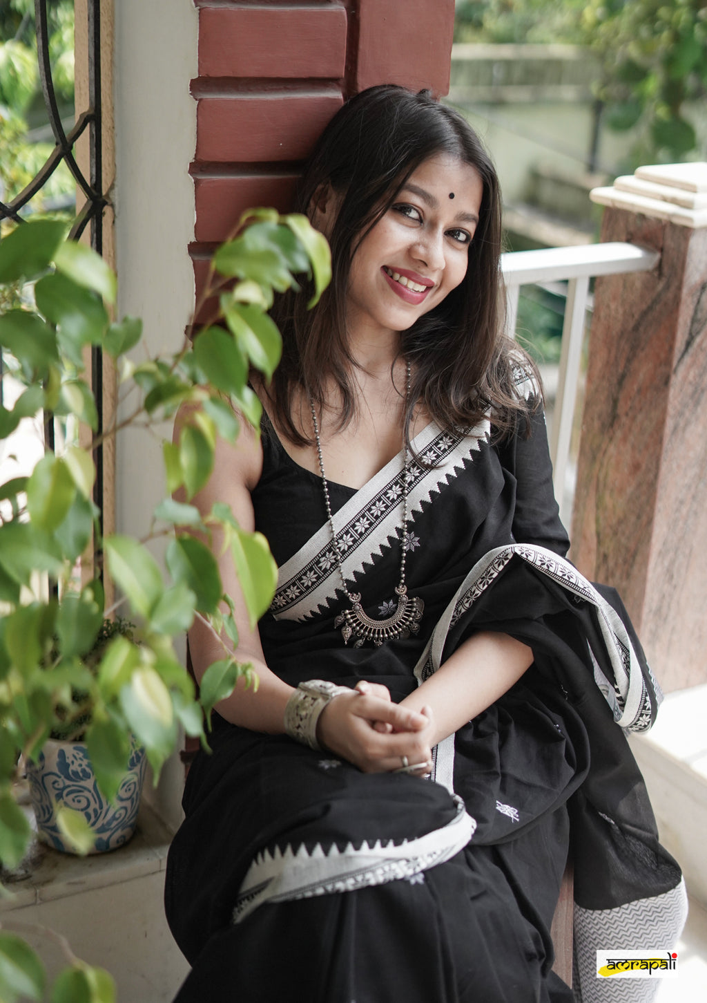 Women's Black Saree with White Traditional Border