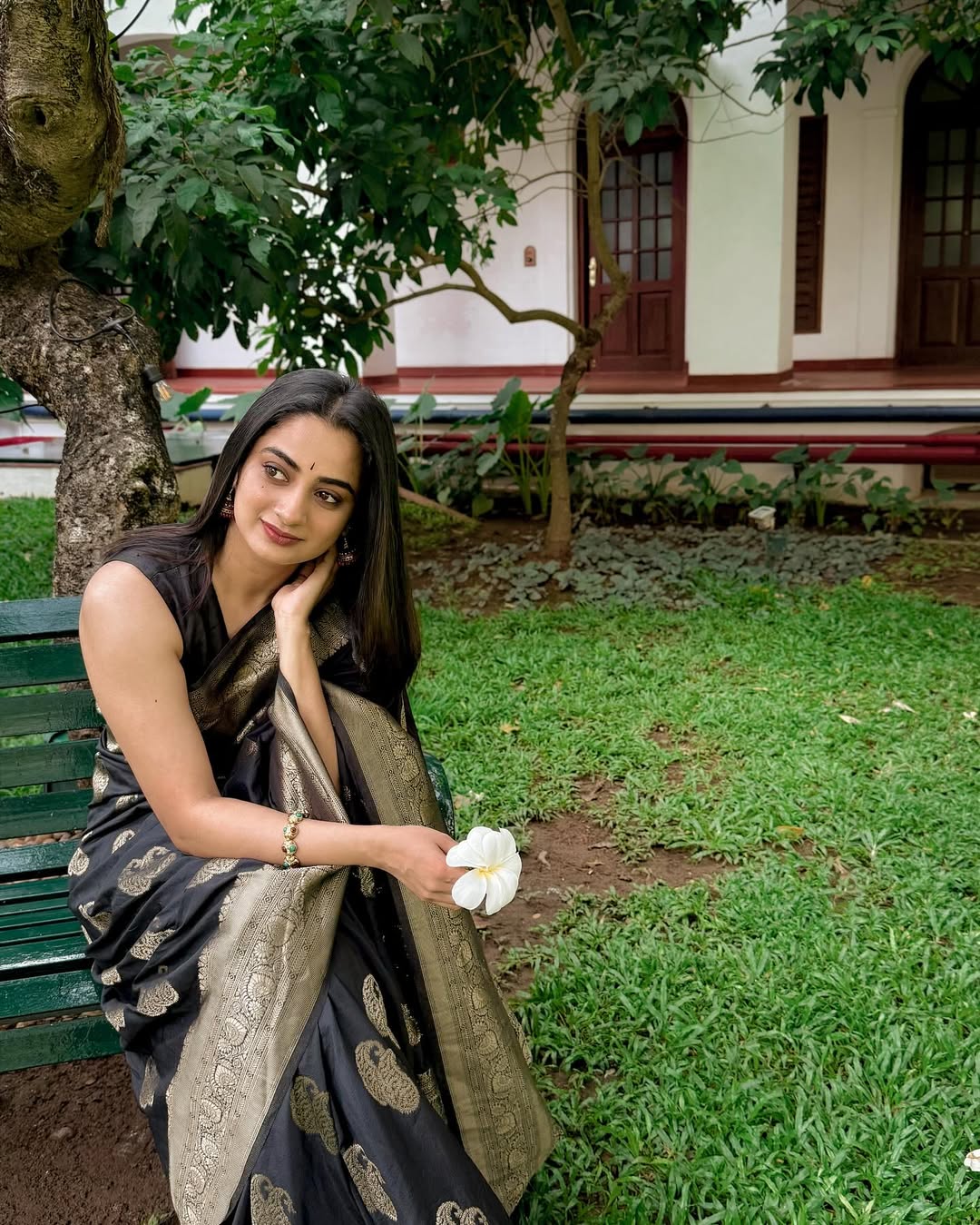 Women's Black Silk Blend Saree with Golden Paisley Woven Design & Rich Zari Border