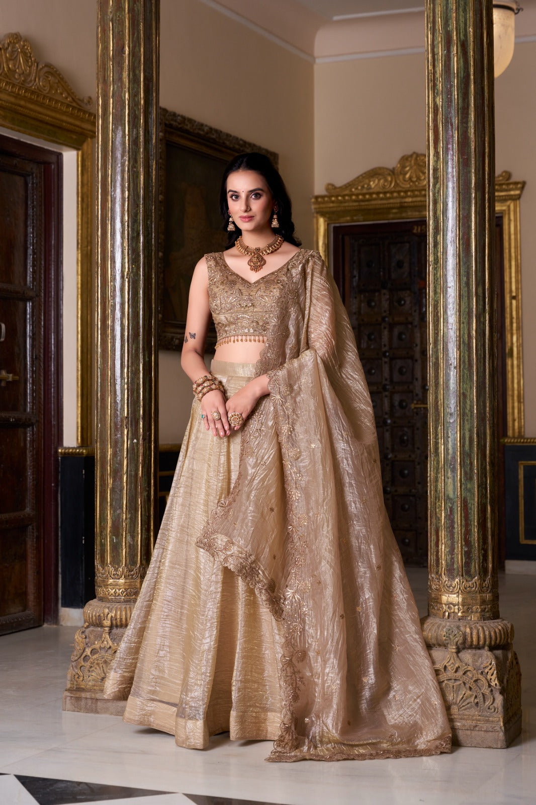 Champagne Gold Designer Lehenga Choli with Embroidered Blouse and Net Dupatta