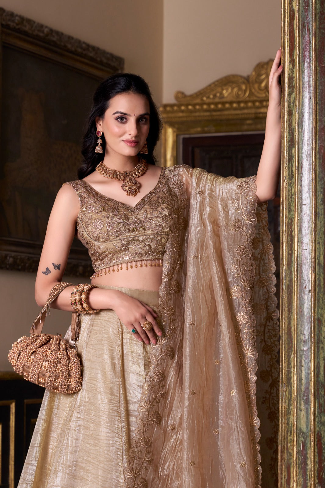 Champagne Gold Designer Lehenga Choli with Embroidered Blouse and Net Dupatta