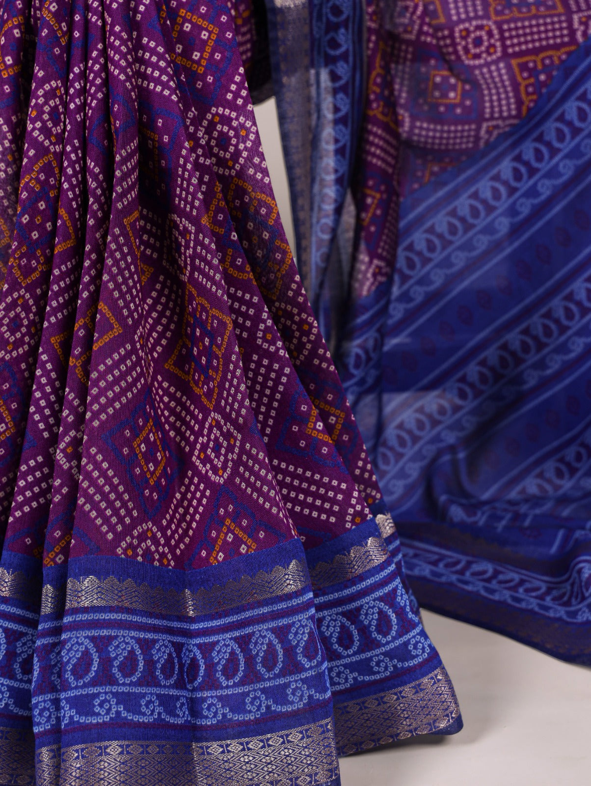 Feel the finesse of polyester viscose Chanderi, styled in Bandhej beauty