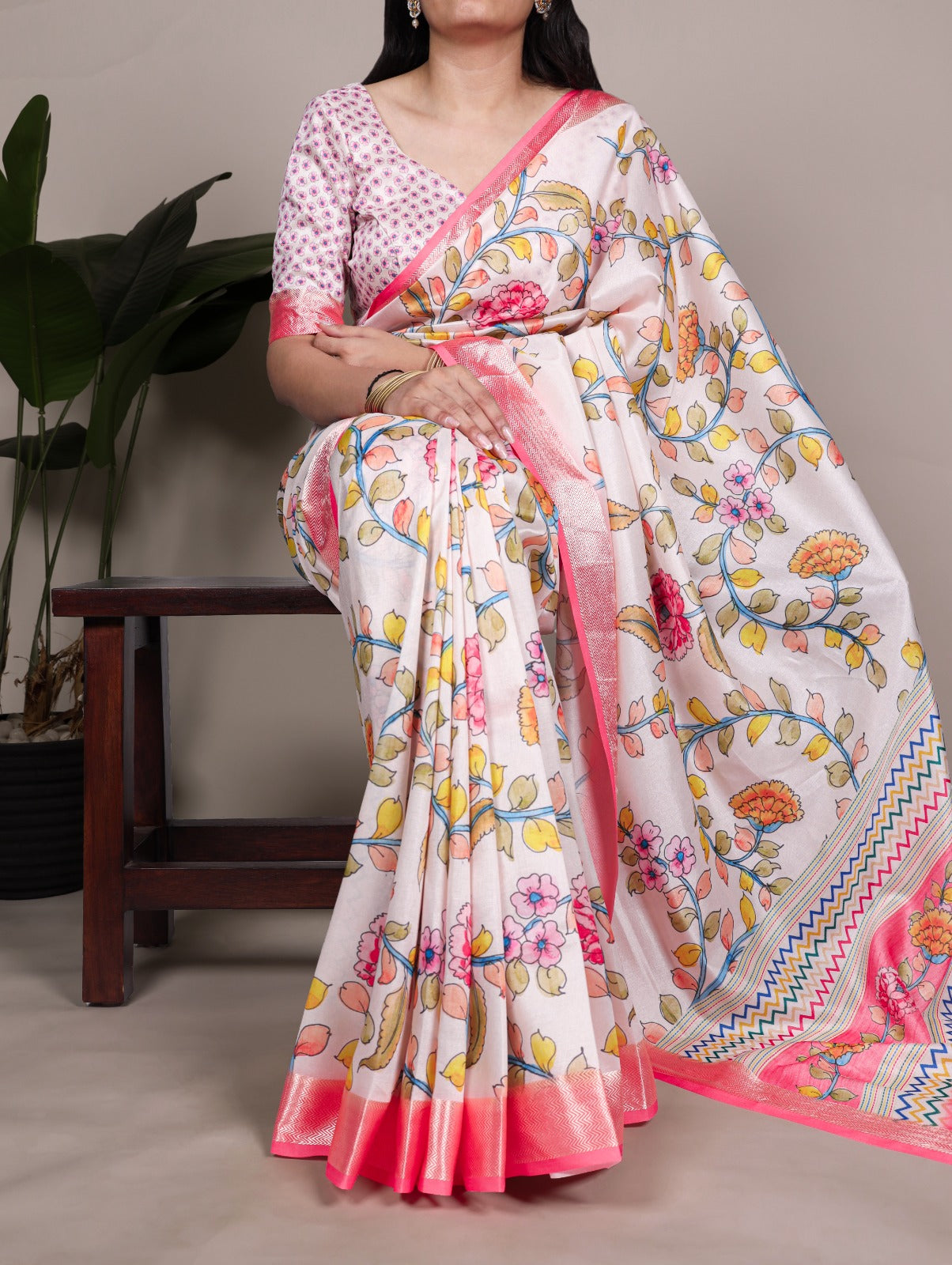 Tasar Silk drape with a glossy viscose border Saree